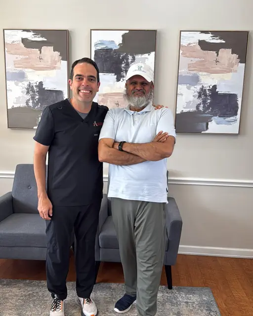 Amir Rangwala with a family dentistry client